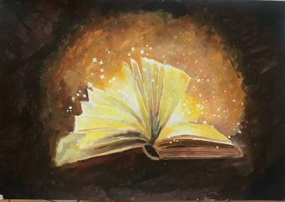 Un libro aperto sventaglia le sue pagine gialle su uno sfondo che sembra infuocato